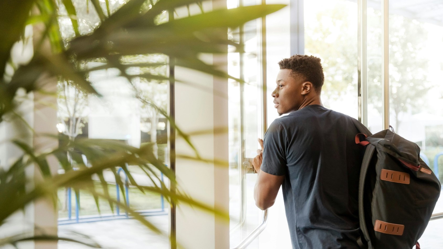 A photo of a student illustrates an op-ed on impact investing careers