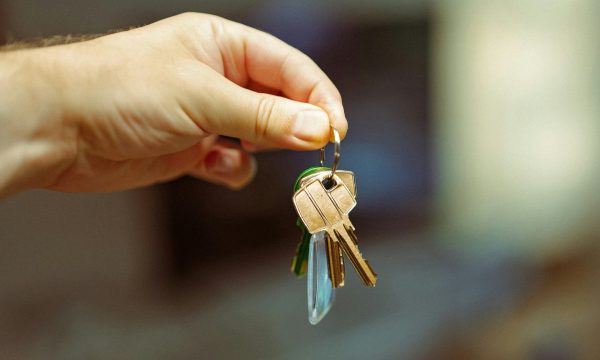 A photo of keys illustrates a guest post on entrepreneurship through acquisition