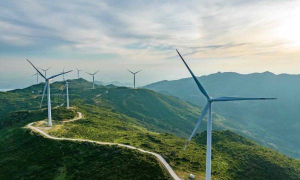 Wind farm on the mountain, blue sky and white clouds